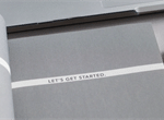 Close shot of a book cover of "Let's Get Started"