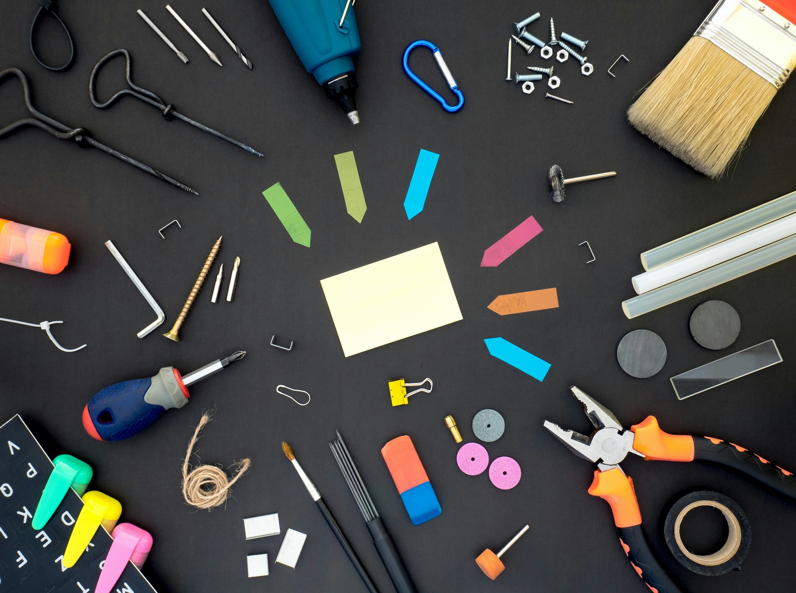 Close up of various arts and crafts tools to improve professional writing skills