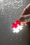 The last piece of a puzzle about to be places