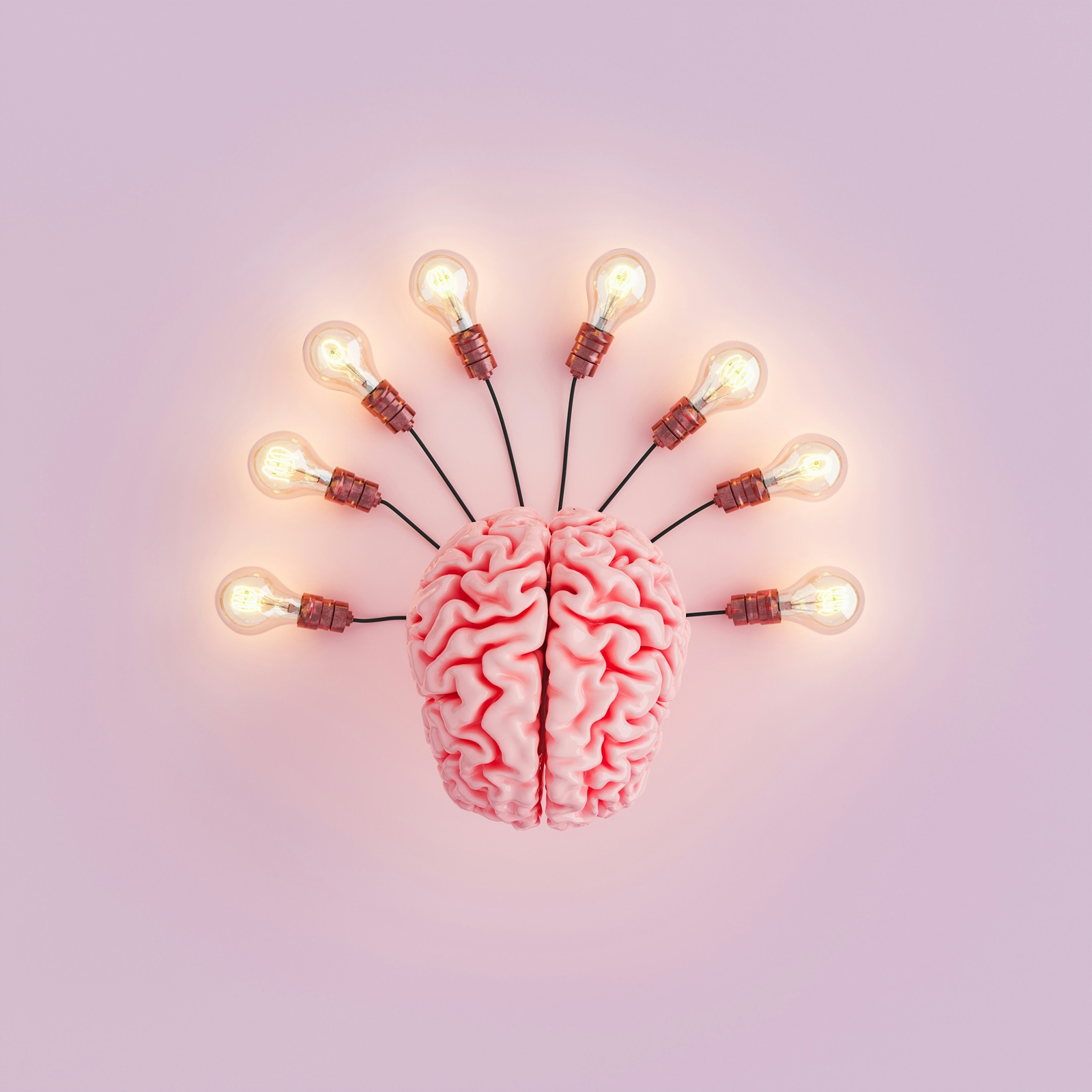 A brain with a bunch of lights coming out of it